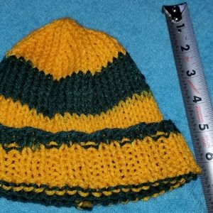 Baby size green/gold knit hat